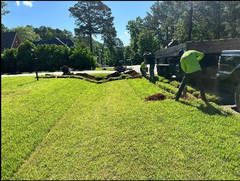 Crew installing fresh sod on a customer property