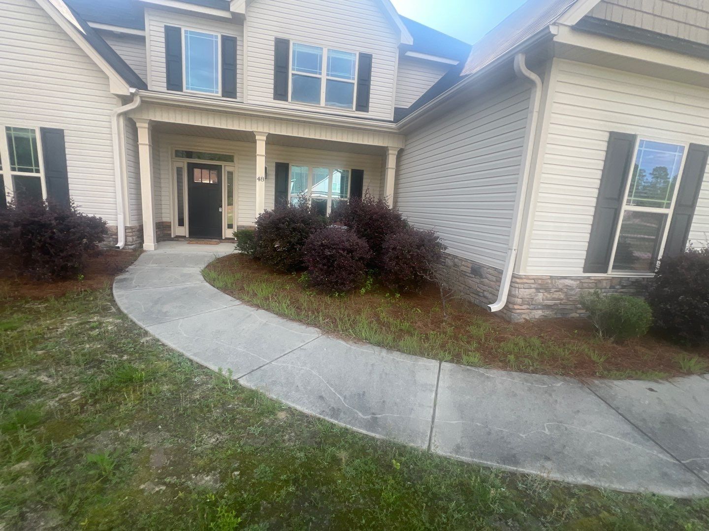 Before front yard landscape makeover by Green Garden Landscaping in Sanford NC